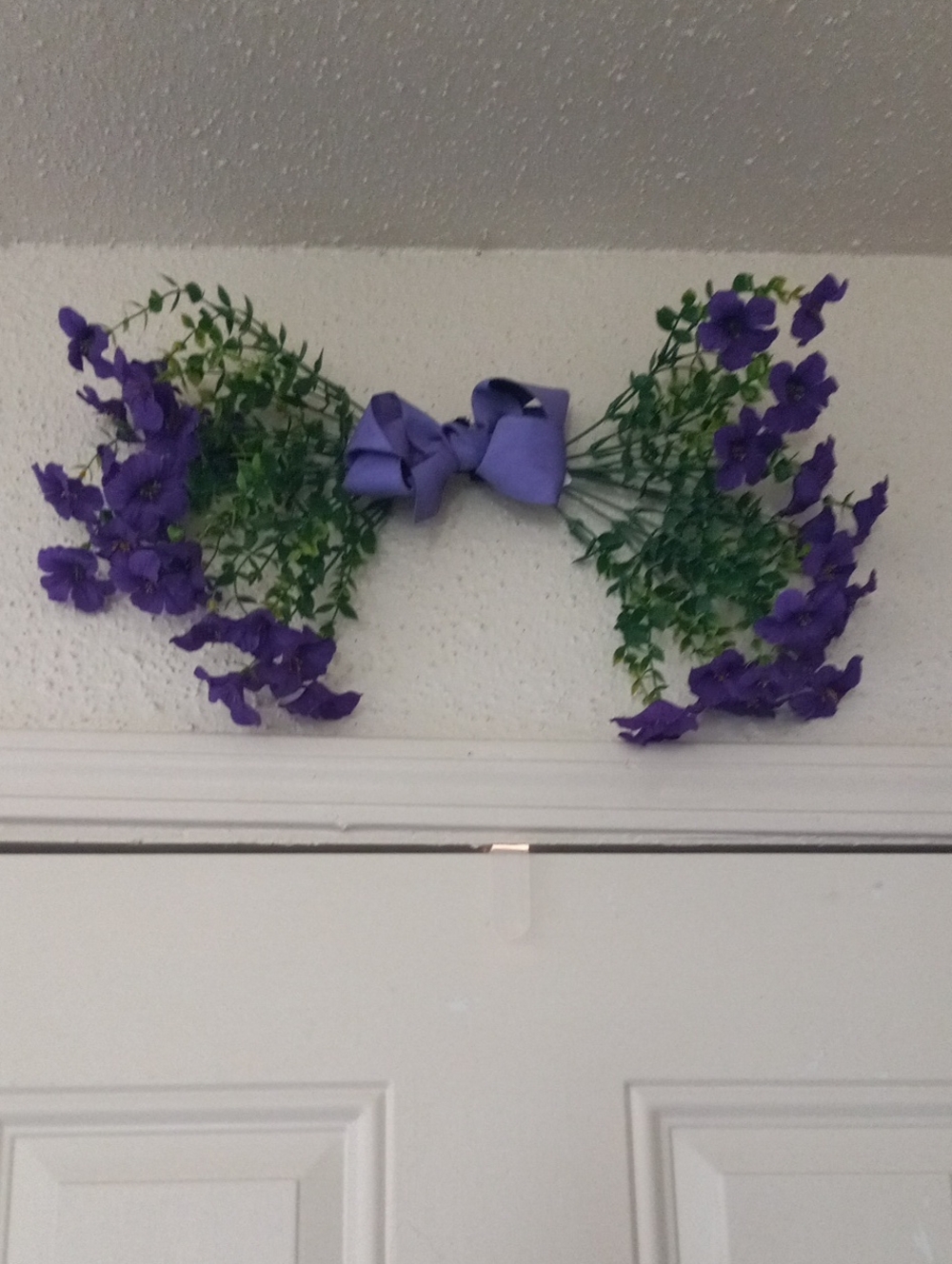 Purple Faux Floral Bow Wall Accent with Greenery